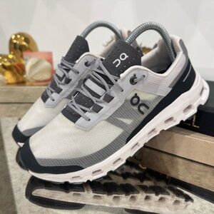 On Running Black and White Athletic Shoes